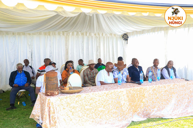 Panel of elders and scholars in discussion
